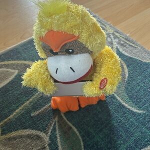 Giggles Sock Monkey doing chicken Dance